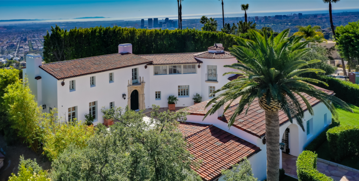 Built in 2019, the Mediterranean-style showplace takes in sweeping views from a dining terrace and hillside swimming pool.