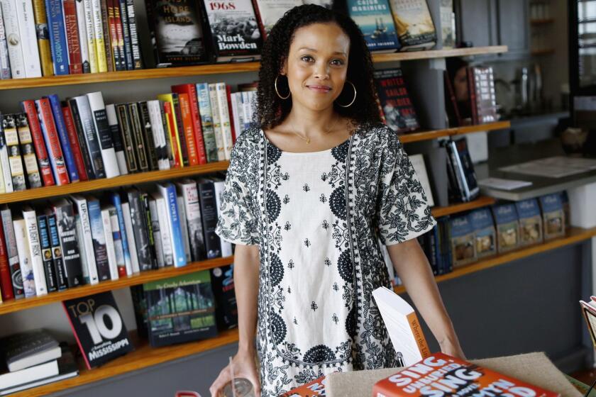 In this Sept. 19, 2017 photo provided by the John D. and Catherine T. MacArthur Foundation, African-American author Jesmyn Ward, poses for a photo in Pass Christian, Miss. The John D. and Catherine T. MacArthur Foundation announced Wednesday, Oct. 11, 2017, that Ward was one of 24 fellows to receive a "genius grant" from the Chicago-based foundation. (John D. and Catherine T. MacArthur Foundation via AP)