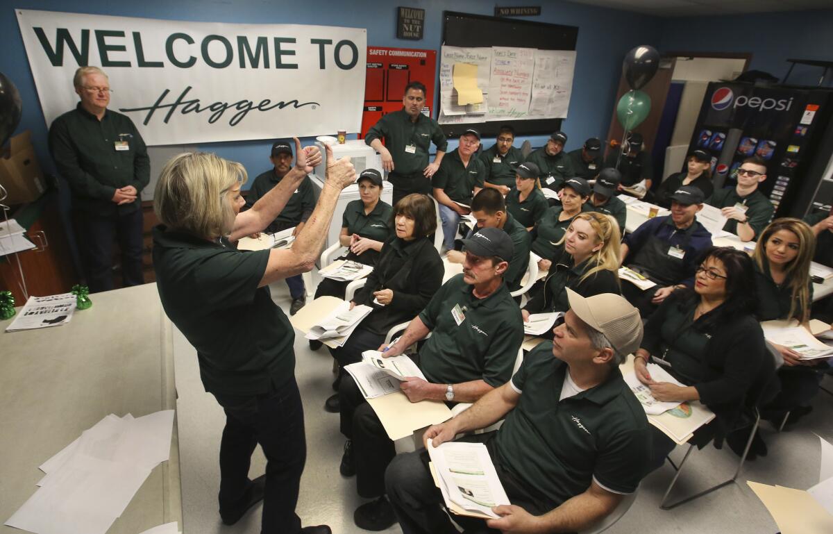 New employees attend an orientation session the day before the grand opening of a Palmdale Haggen grocery store, formerly an Albertsons, on March 23.