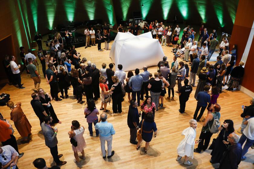 Members of the L.A. Bass Quintet perform Veronika Krausas' music for "Porcupine," a collaboration with Ana Prvacki, who conceived and designed the tent. The program at Walt Disney Concert Hall was part of the new music marathon, "Noon to Midnight."