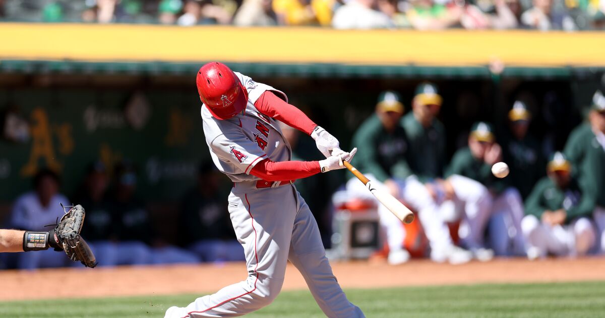 Angels score 11 runs in third inning en route to routing Athletics