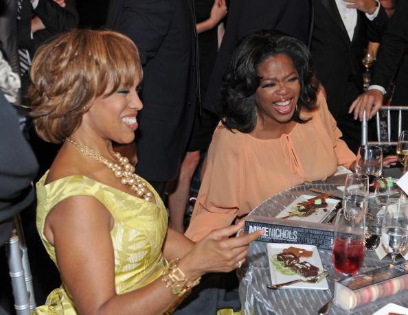 Oprah Winfrey (R) and Gayle King in the audience during the 38th AFI Life Achievement Award honoring Mike Nichols held at Sony Pictures Studios on June 10, 2010 in Culver City, California.