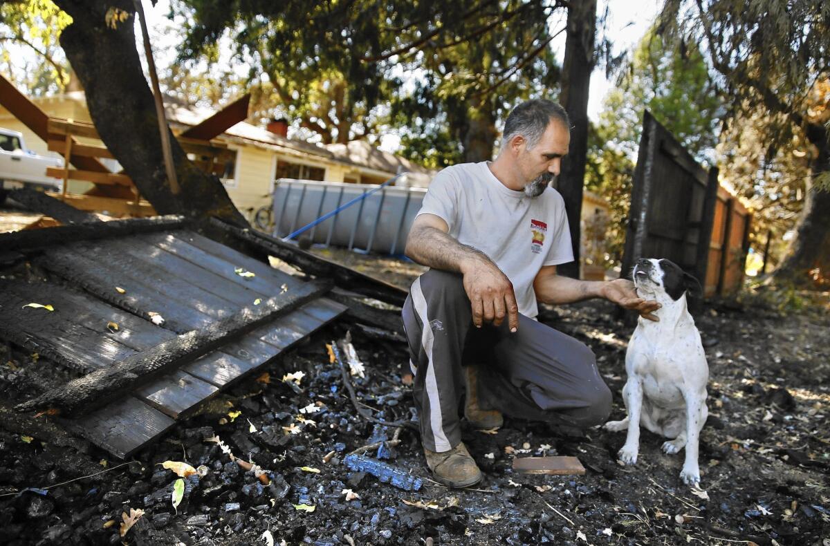 Francisco Cervantes stayed at his Middletown home, fighting the flames first with a garden hose, then buckets of water from his neighbor's pool.