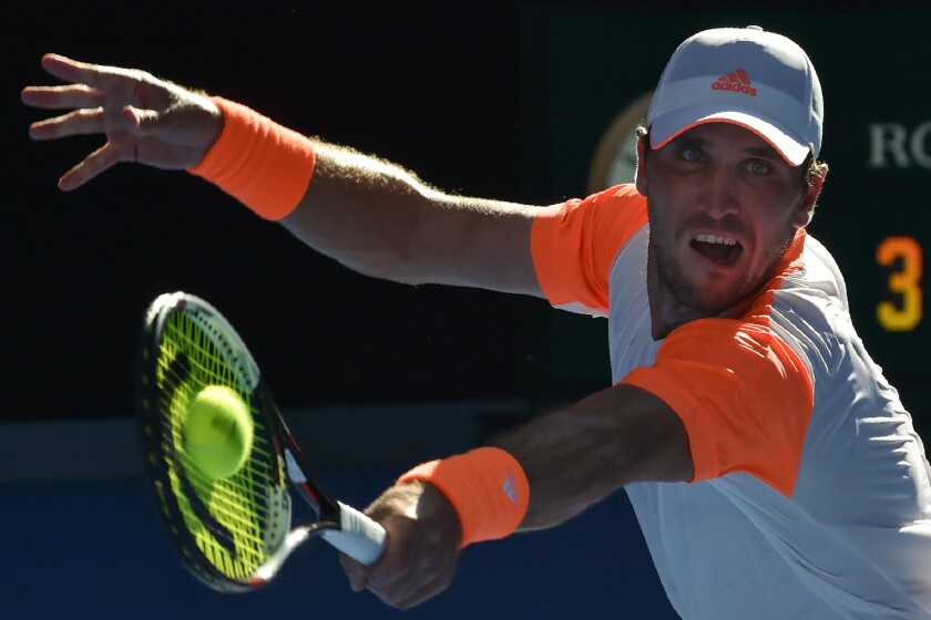Mischa Zverev hits a return shot against No. 1-ranked Andy Murray during their men's singles fourth round match at the Australian Open on Jan. 21.