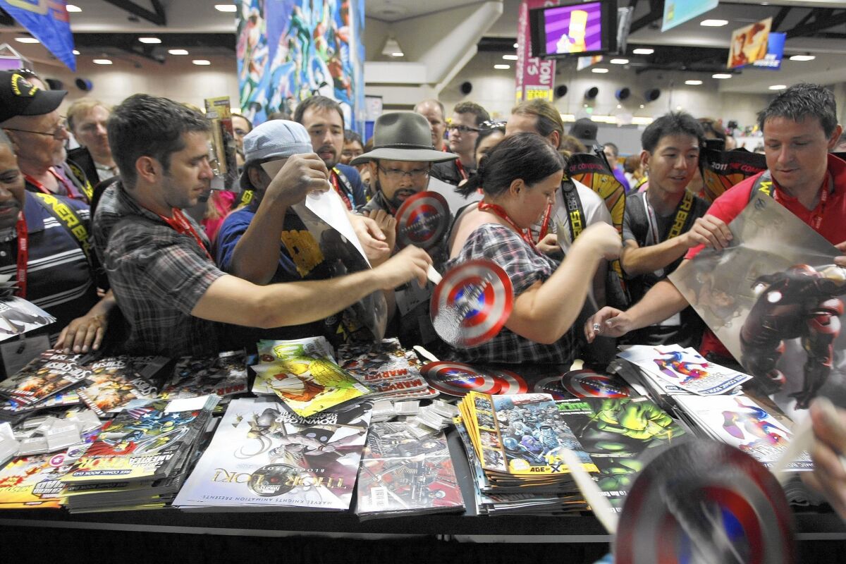 Comic-Con International, seen at the San Diego Convention Center in 2011, will stay through at least 2018 in the seaside SoCal city where it started in 1970.