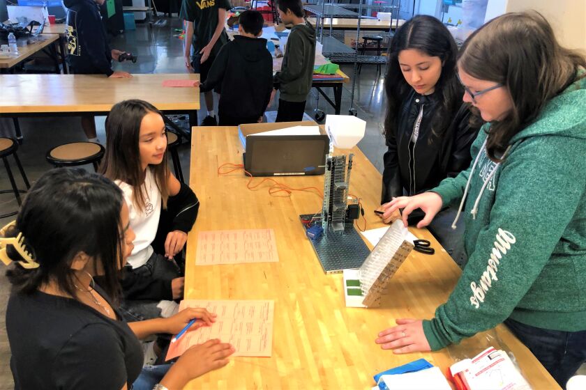 Costa Mesa Middle School students collaborate with high schoolers enrolled in an Engineering Design pathway.