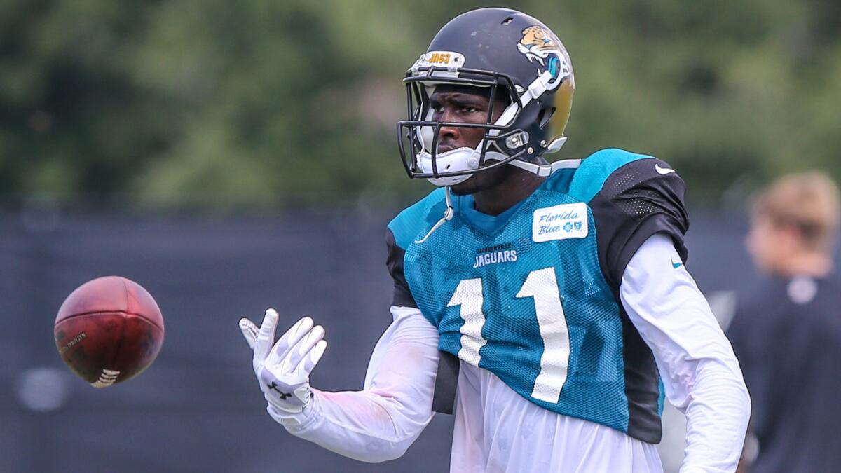 Jacksonville Jaguars wide receiver Marqise Lee tosses the ball during a team practice session in July.