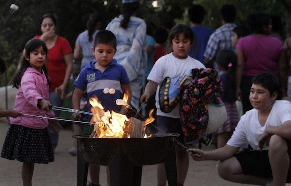 Children get a taste of marshmallows and nature at Vista Hermosa Park near downtown L.A. during free campfire nights.