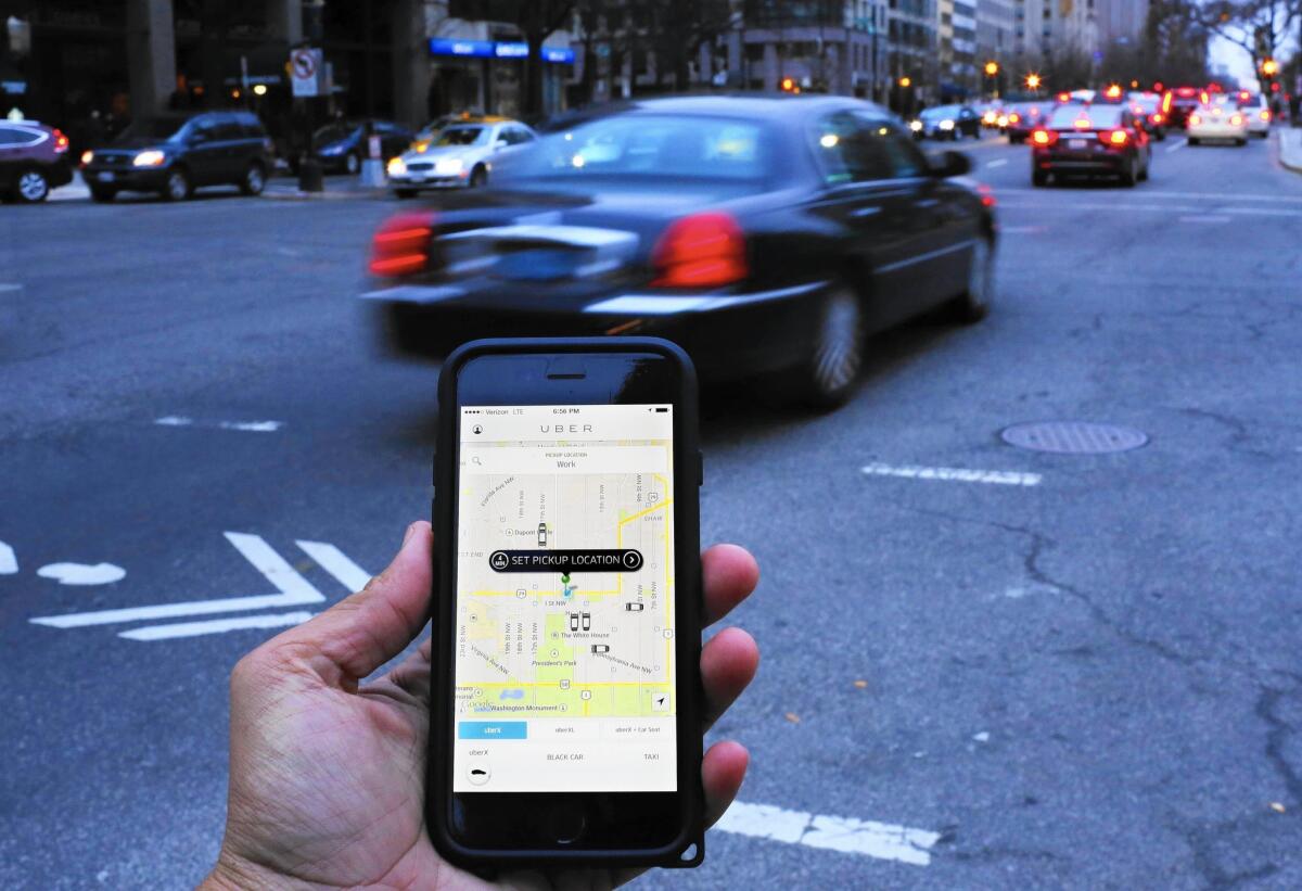 Uber is nowhere close to turning a profit, according to leaked financial information. Above, the ride-sharing app used in Washington, D.C., in March.