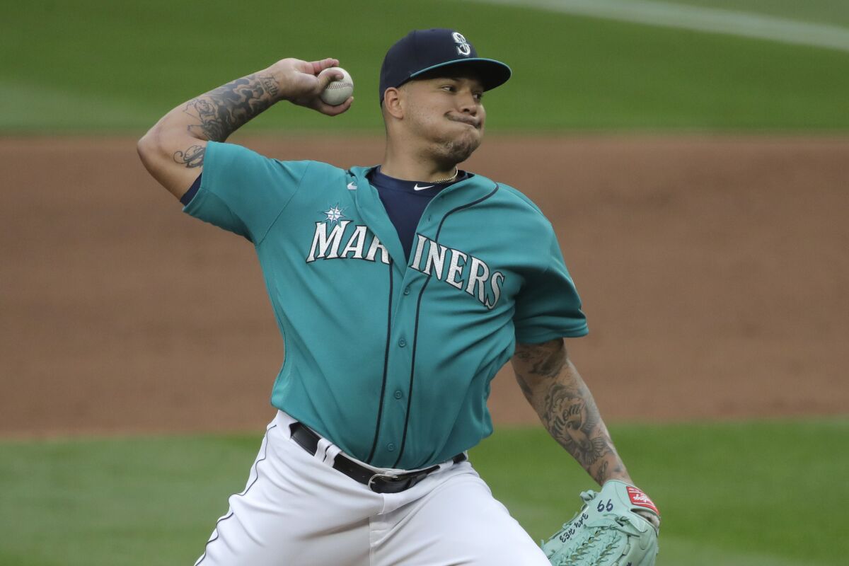 Seattle Mariners starting pitcher Taijuan Walker throws against the Oakland Athletics during the fifth inning of a baseball game, Friday, July 31, 2020, in Seattle. (AP Photo/Ted S. Warren)