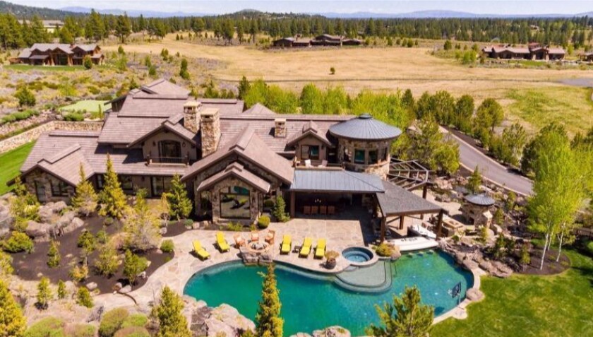 Built by Drew Bledsoe, the 10-acre compound centers on a nearly 15,000-square-foot mansion with views of the Cascades.