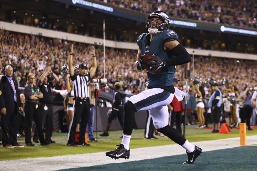 Philadelphia Eagles tight end Zach Ertz (86) scores a touchdown during the first half of an NFL football game against the Tampa Bay Buccaneers, Thursday, Oct. 14, 2021, in Philadelphia. (AP Photo/Rich Schultz)
