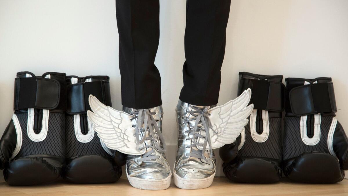 Olajide and his signature winged shoes.