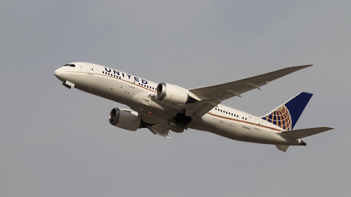 A Boeing 787 Dreamliner operated by United Airlines takes off at Los Angeles International Airport on Jan. 9, 2013.