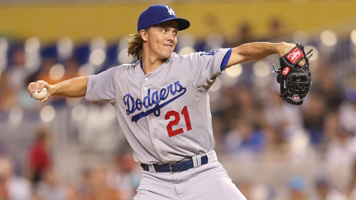 Dodgers starter Zack Greinke delivers a pitch during the first inning of Sunday's game against the Miami Marlins at Marlins Park.