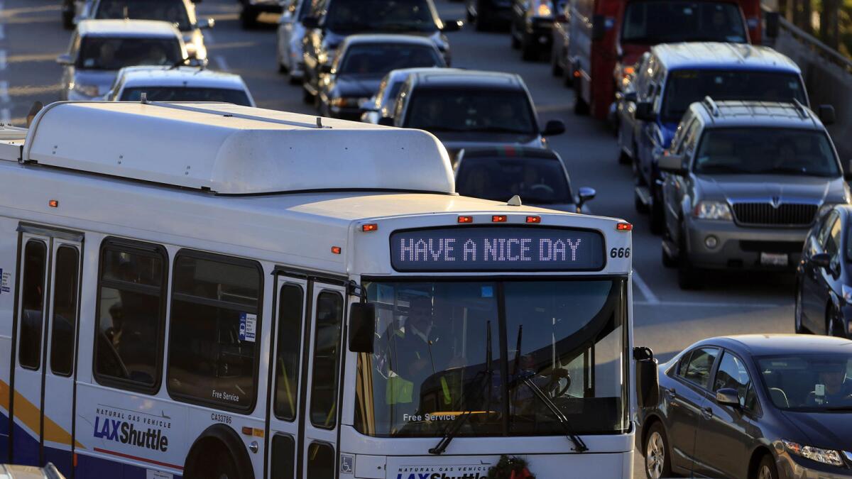 Traffic on the departure level at LAX is heavy on the morning before Thanksgiving.