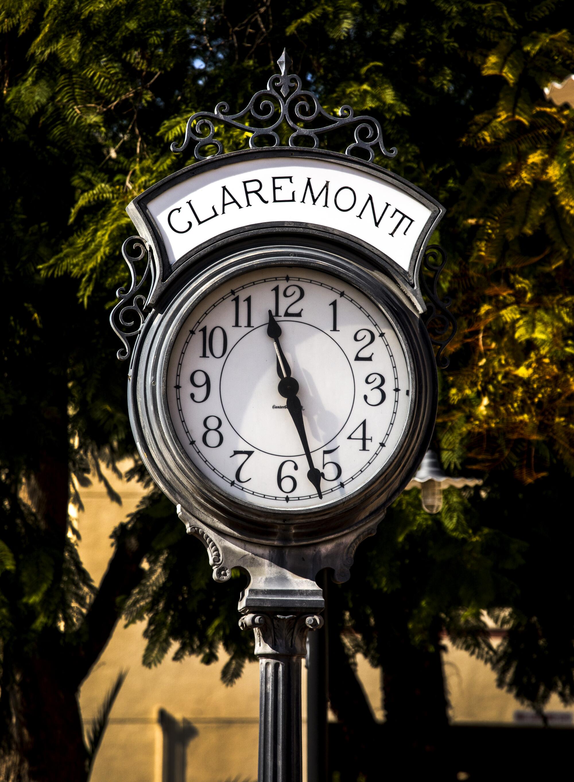 A cast-iron clock displays the time for Metrolink passengers at the Claremont Depot.