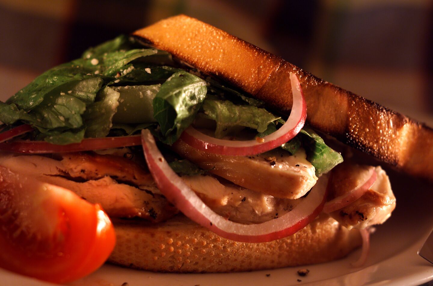 Caesar salad sandwiches with chicken.