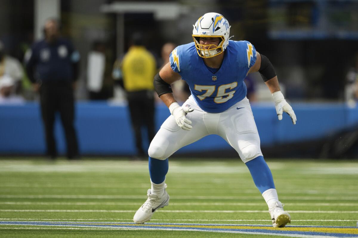 Chargers rookie offensive tackle Joe Alt readies to pass block.