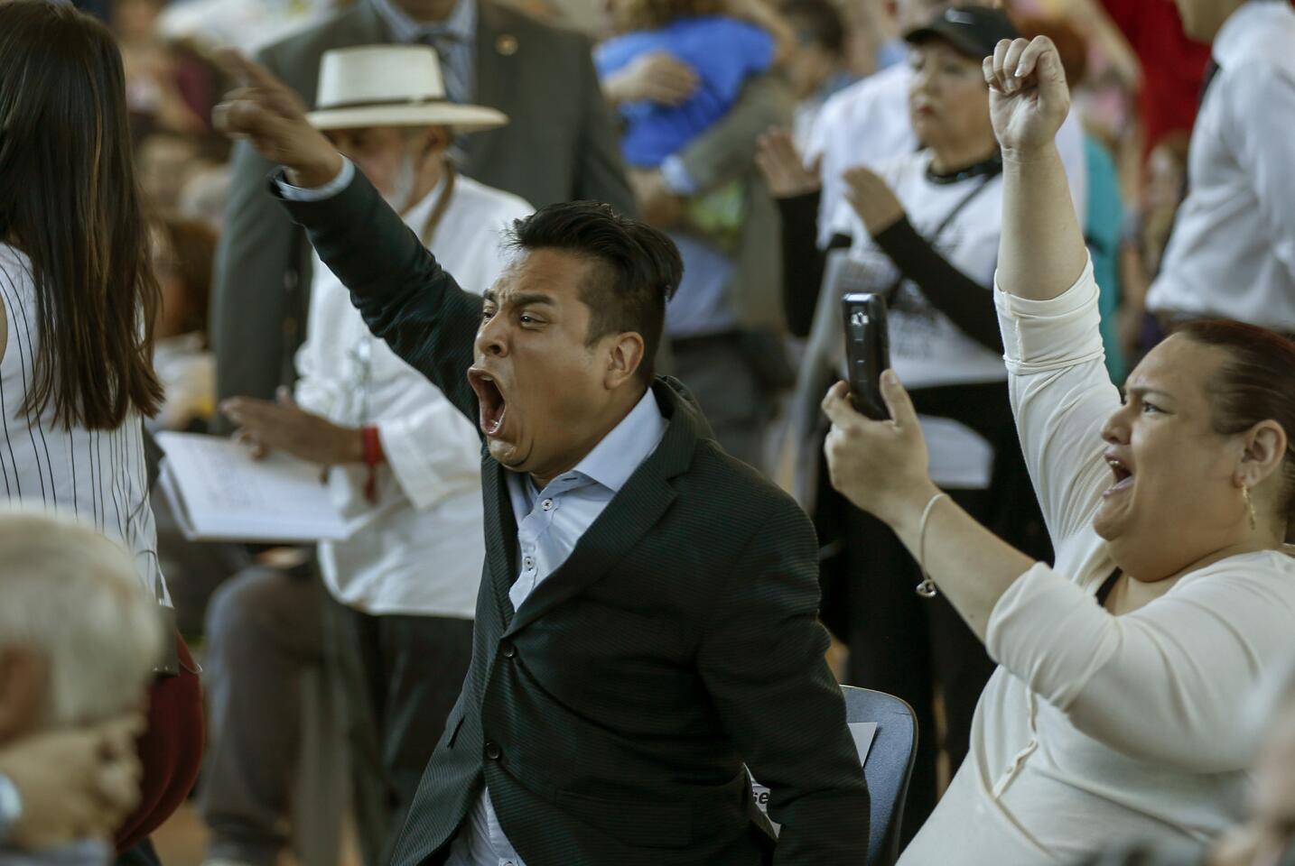 Hundreds of Sacramento residents shouted, listened and asked questions while acting ICE Director Thomas Homan and Sacramento County Sheriff Scott Jones held a community forum about immigration.