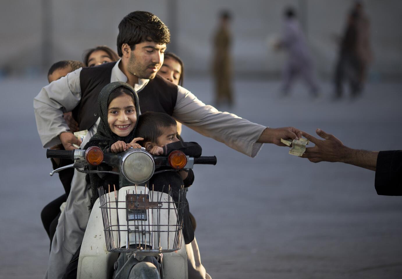 Afghan family on motorbike