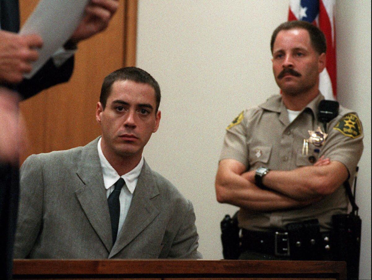 Robert Downey Jr. appears in a Malibu courtroom on July 25, 1996, after his third arrest in a month.