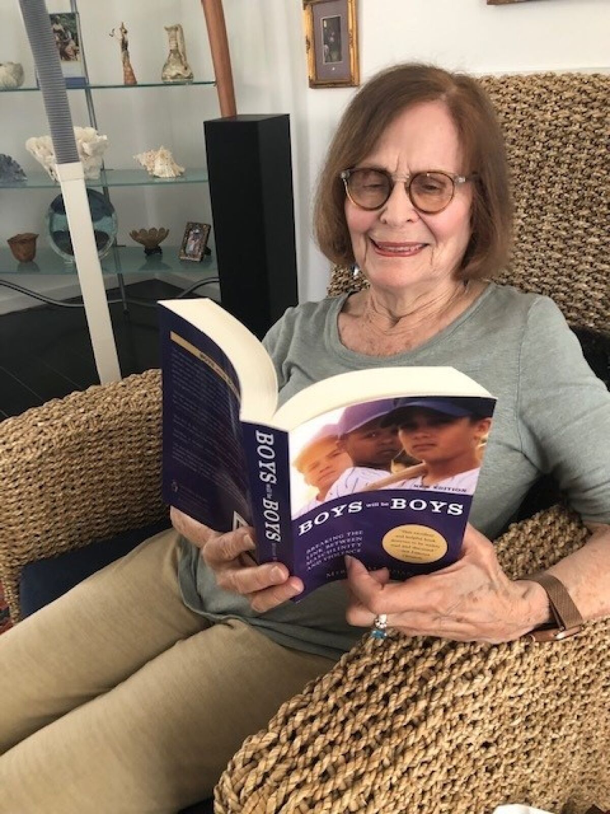 Myriam Miedzian sits in her La Jolla home, where she still reads "Boys Will Be Boys" from time to time.
