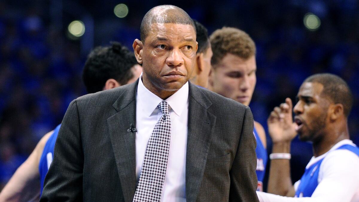 Clippers Coach Doc Rivers walks back to the bench following a timeout in Game 1 of the Western Conference semifinals against the Oklahoma City Thunder.