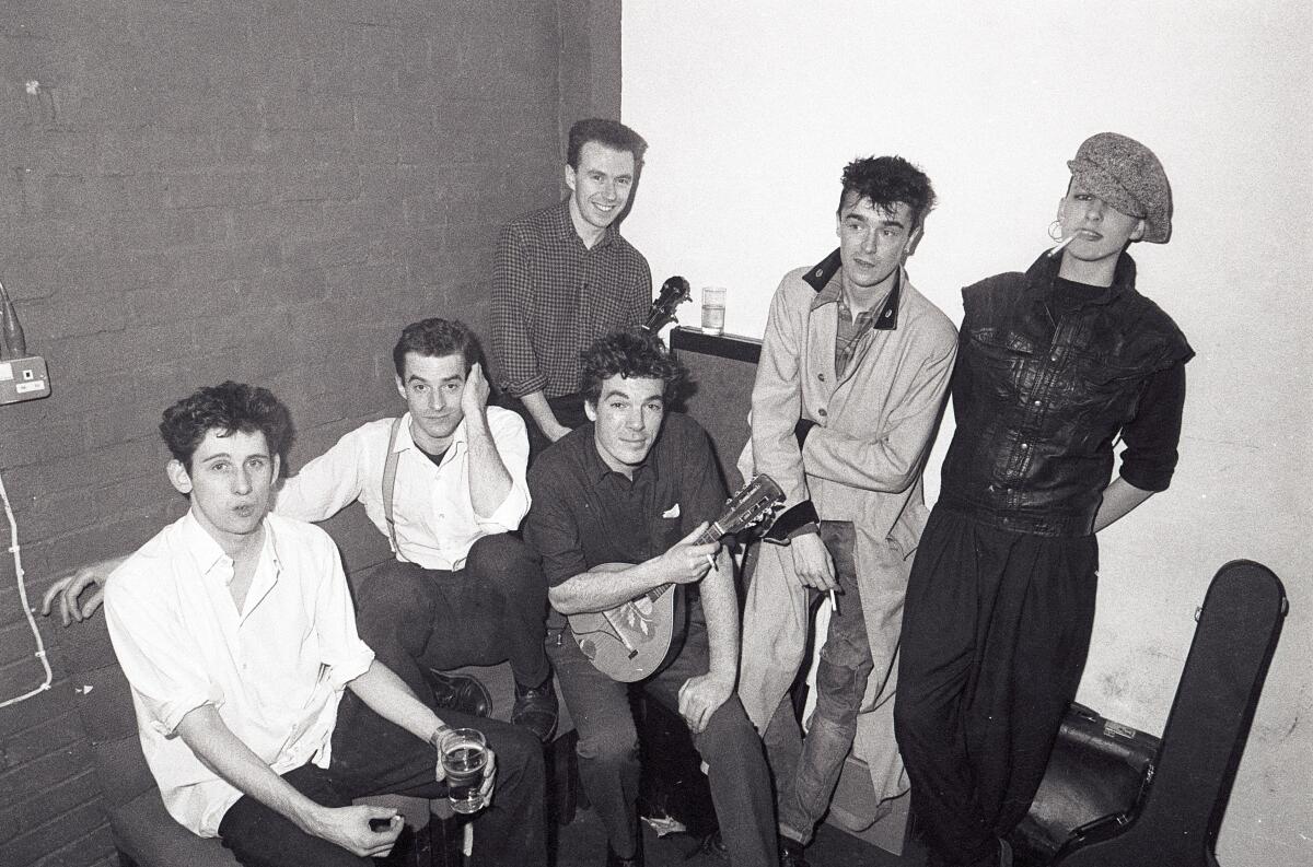 A black-and-white photo of six young musicians in 1984.