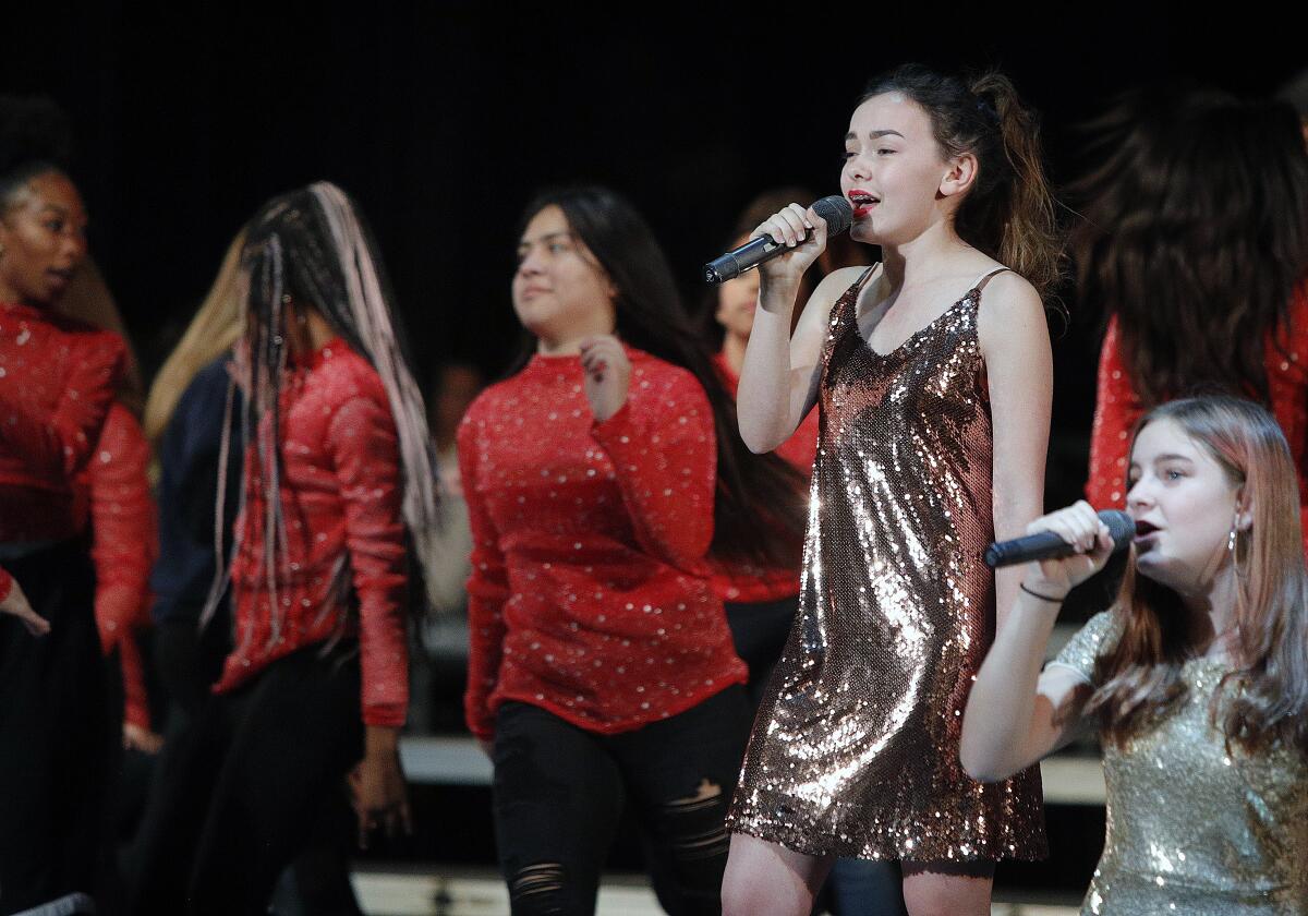 Scarlet Lastrapes, 15, performs during a rehearsal Tuesday of this year's Holiday Spectacular at Burroughs High School.