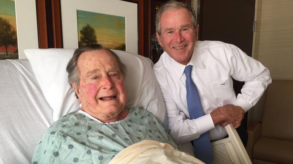 Former President George H.W. Bush is visited by his son, former President George W. Bush, at Houston Methodist Hospital on April 20, 2017.