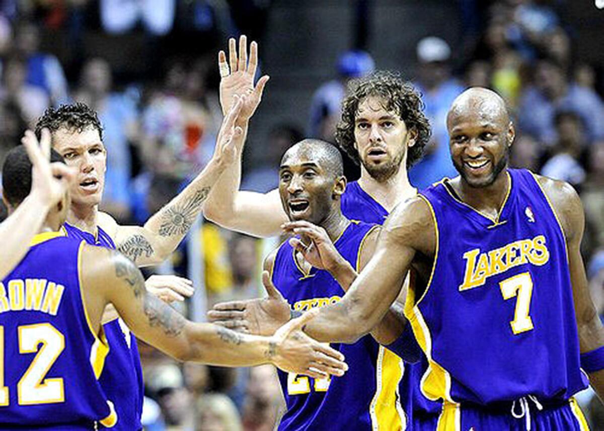 Lakers teammates congratulate Shannon Brown, left, during the 2009 Western Conference finals.
