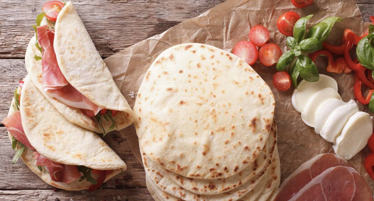 Piadina is Italian flatbread filled with meat, cheese and produce.