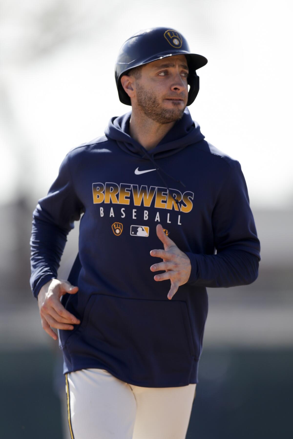 Milwaukee Brewers' Ryan Braun runs during spring training on Feb. 19 in Phoenix.
