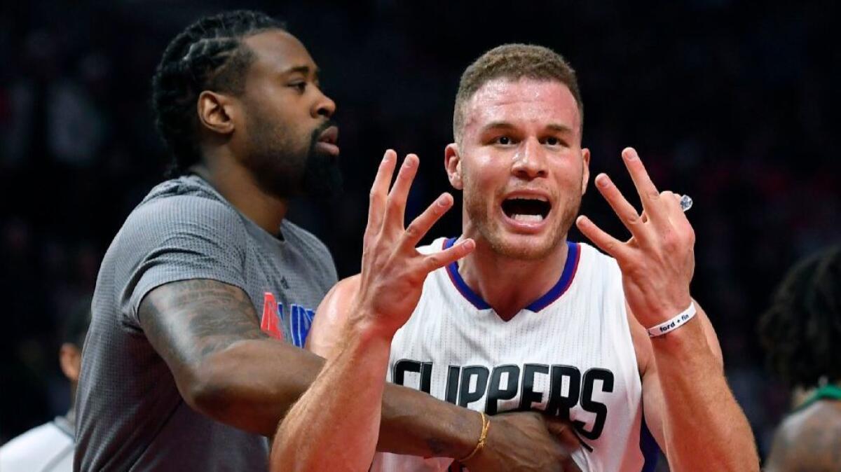Clippers forward Blake Griffin, right, with center DeAndre Jordan during a game against the Boston Celtics on March 6.