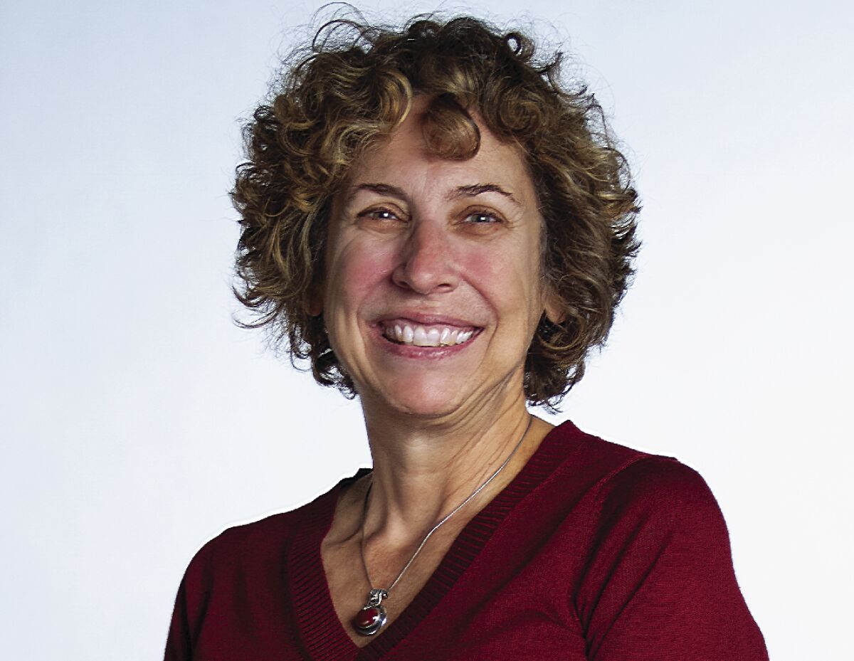 Portrait of Deborah Anderluh smiling
