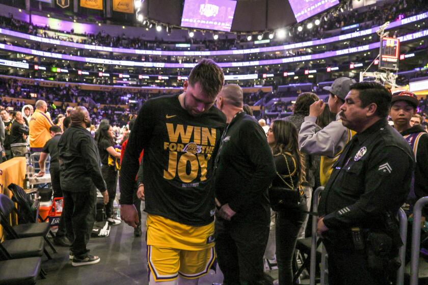 Los Angeles, CA, Wednesday, April 30, 2025 - Los Angeles Lakers guard Luka Doncic (77) leaves the court after a loss to the Minnesota Timberwolves in game 5 of the first round of the NBA playoffs at Crypto.com Arena. (Robert Gauthier/Los Angeles Times)