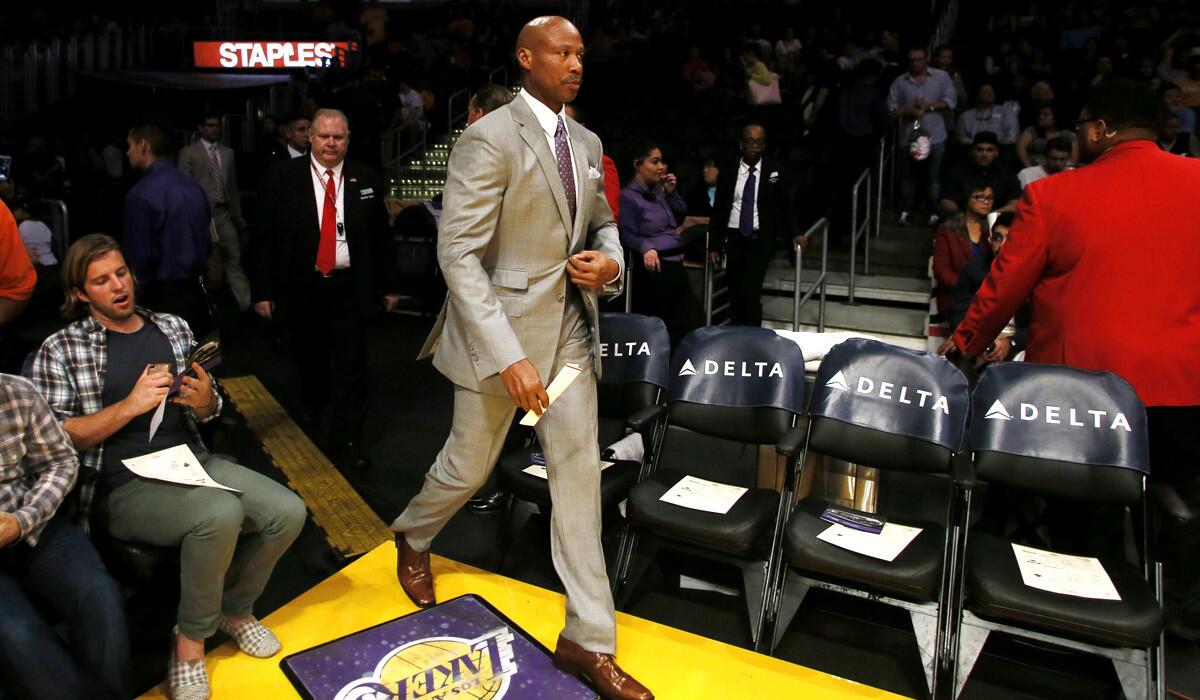 Lakers head coach Byron Scott walks onto the court before the game against the New York Knicks on Thursday.