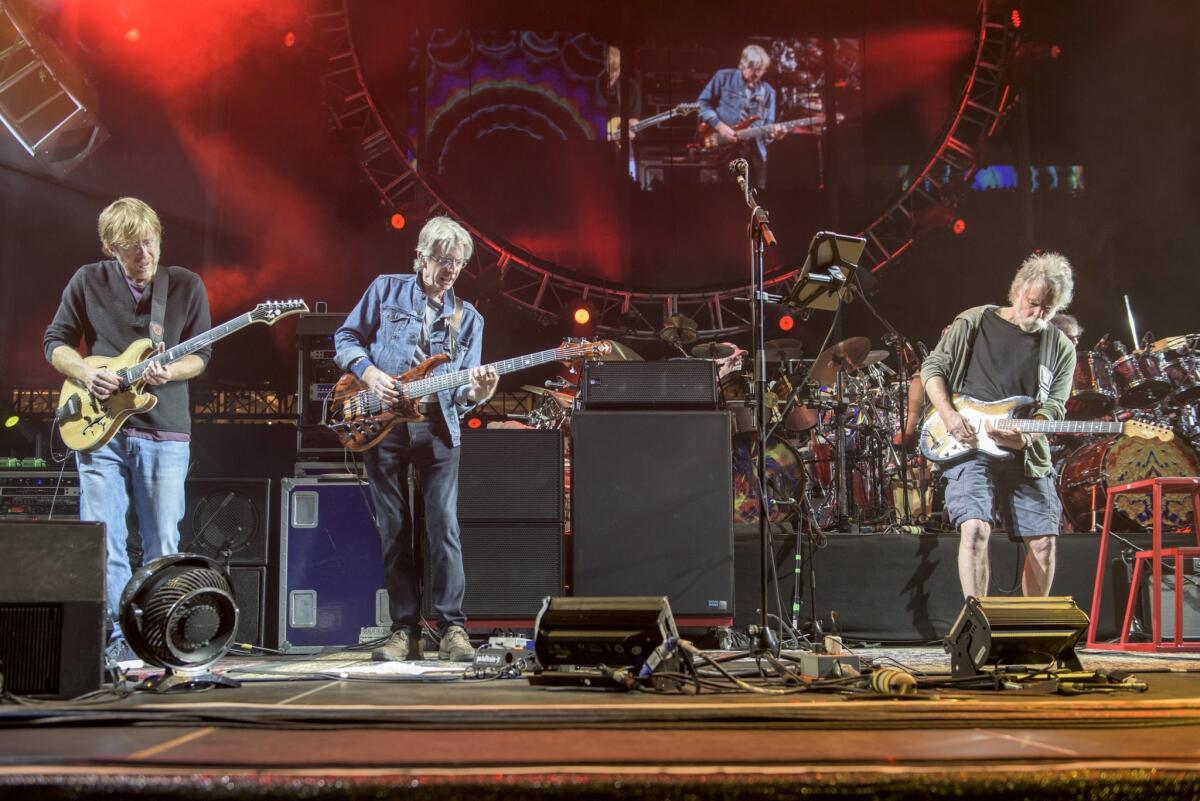 Trey Anastasio, from left, Phil Lesh and Bob Weir perform at the Grateful Dead Fare Thee Well Show at Levi's Stadium on Saturday in Santa Clara, Calif.