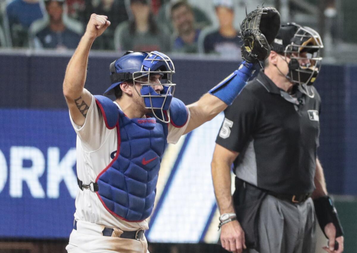 Arlington, Texas, Wednesday, October 7, 2020. Catcher Austin Barnes celebrates.