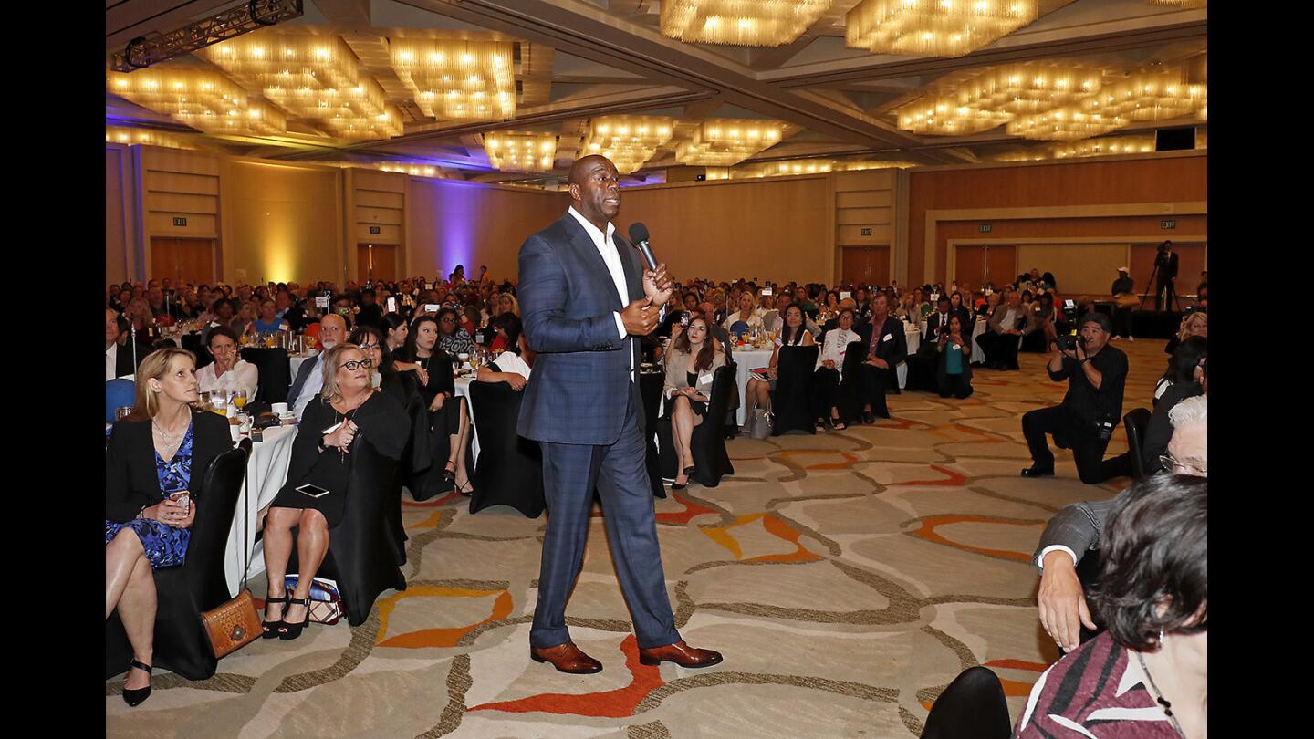 Keynote speaker Earvin "Magic" Johnson, Los Angeles Lakers president of basketball operations, talks during the 15th annual Women's Philanthropy Fund breakfast at Hotel Irvine on May 8.