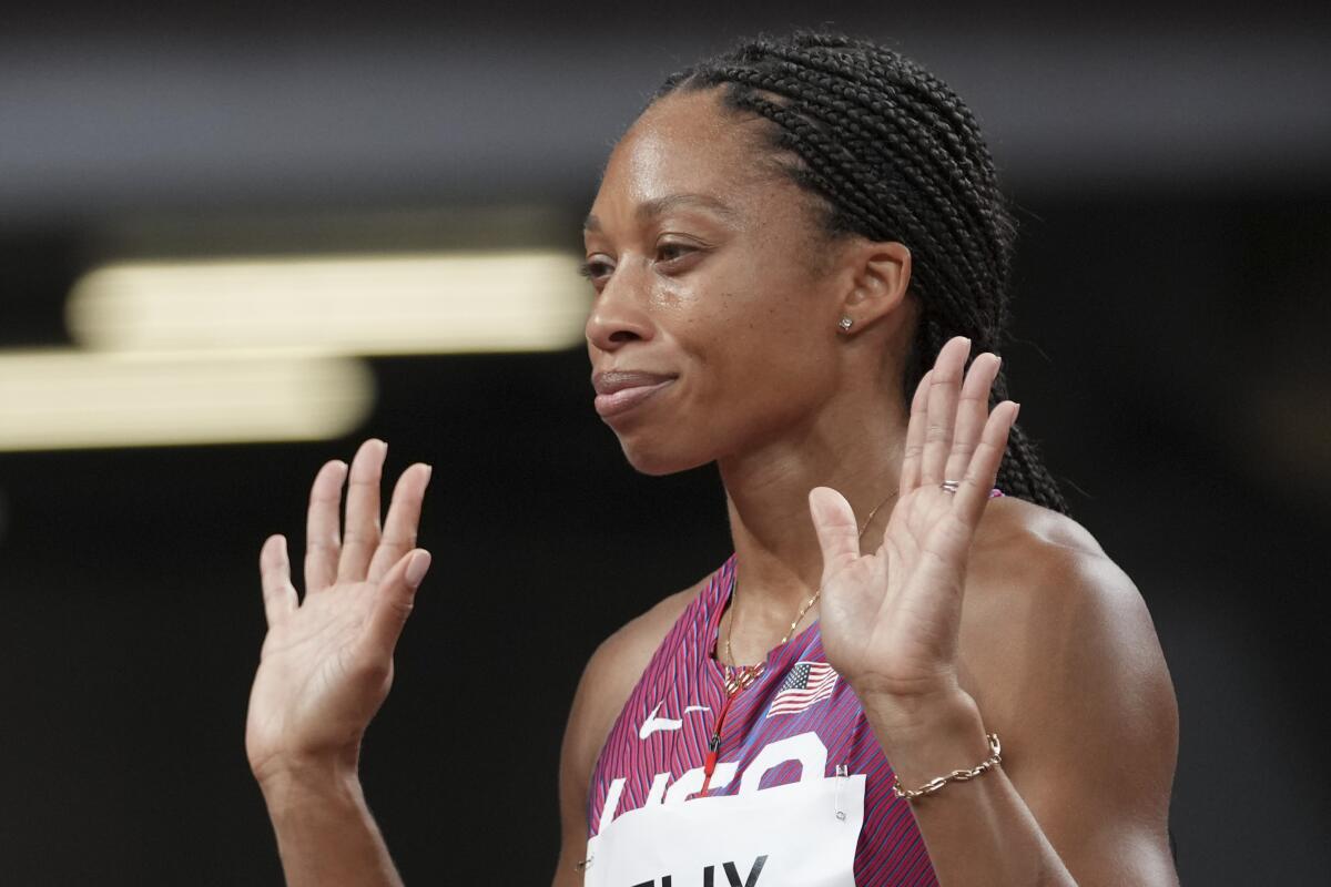 Allyson Felix, of the United States, reacts prior to the start in a semifinal of the women's 400-meters at the 2020 Summer Olympics, Wednesday, Aug. 4, 2021, in Tokyo. (AP Photo/Matthias Schrader)