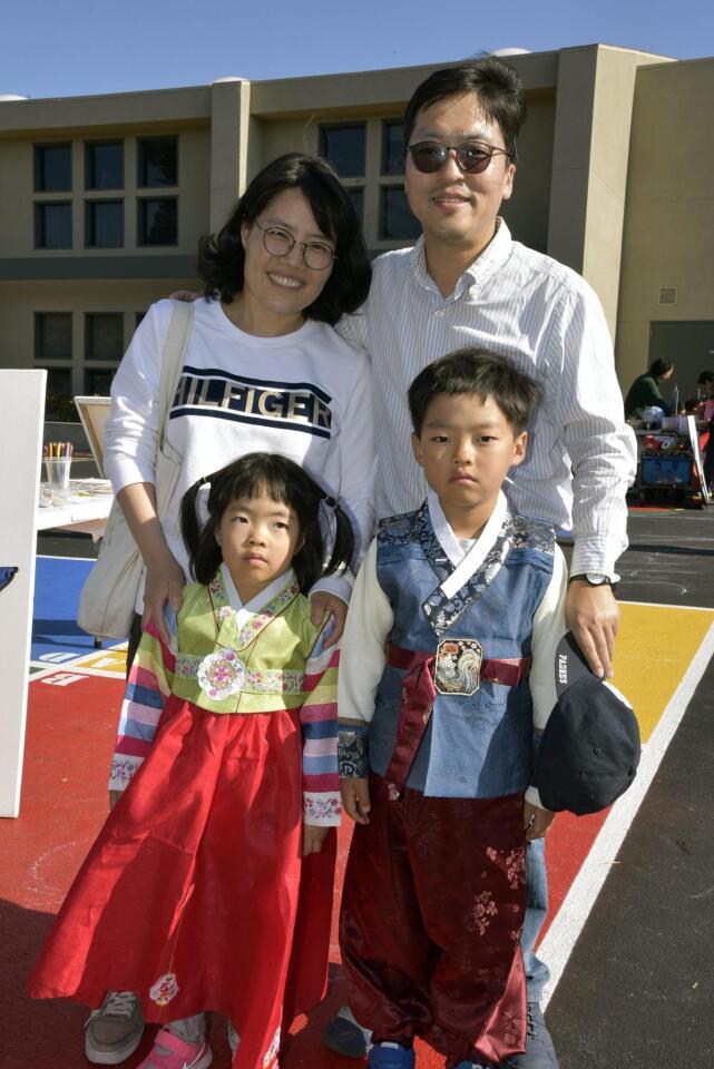 Gyu Young Hur and Tony Seo, with Leona and Jace
