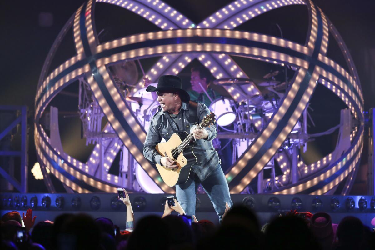 Garth Brooks performs at a sold-out concert at the Allstate Arena in Rosemont, Ill., a Chicago suburb. The Sept. 4 show marked the end of Brooks' 13-year tour hiatus.