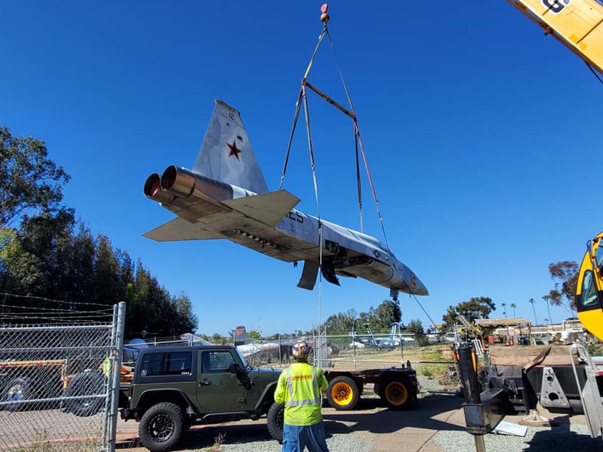 The F-5 being dismantled and transported out of the Flying Leatherneck Aviation Museum. 