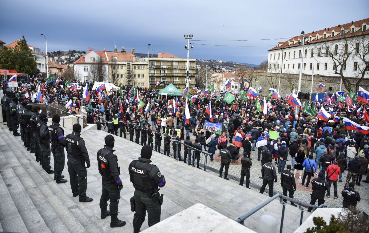 Thousands of Slovaks rally to protest a defense military treaty with the United States on Tuesday,