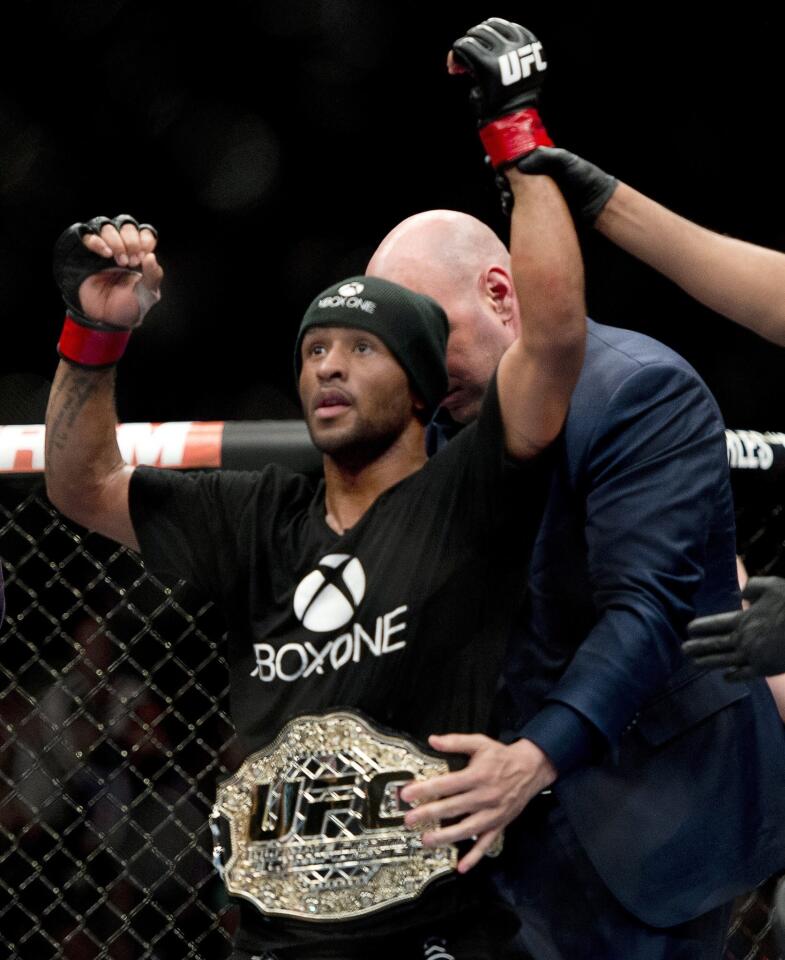 Demetrious Johnson successfully defended the UFC flyweight belt for the fourth time Saturday night.
