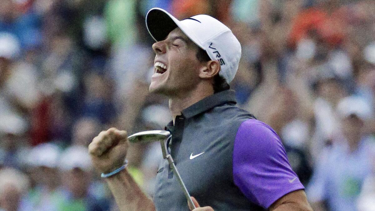 Rory McIlroy, of Northern Ireland, celebrates after winning the PGA Championship golf tournament at Valhalla Golf Club.