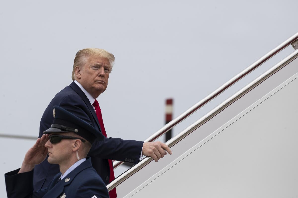 Trump boards Air Force One