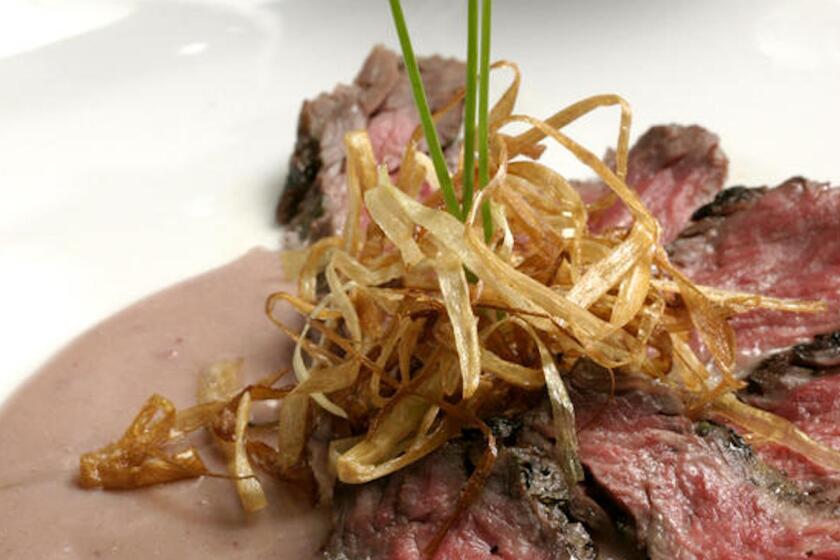 Recipe: Grilled skirt steak with crispy leeks and beurre rouge